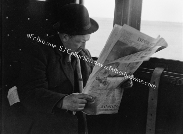 PASSENGER READING EVENING HERALD